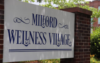 Millford Wellness Village Sign